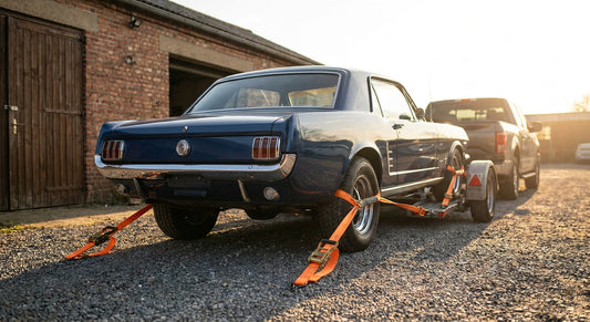 Tow dolly straps for rear-wheel drive vehicles